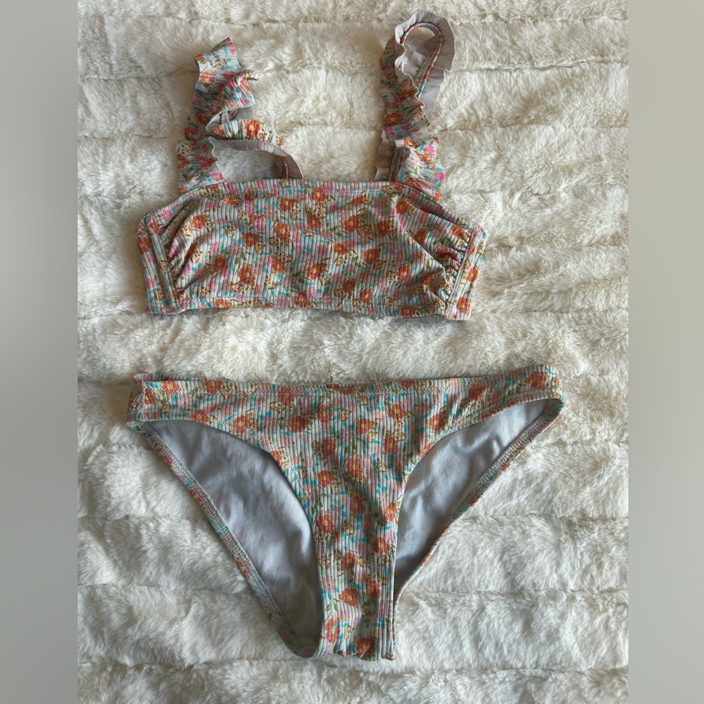 girls bathing suit: been worn, i’m good conditions, white with flowers